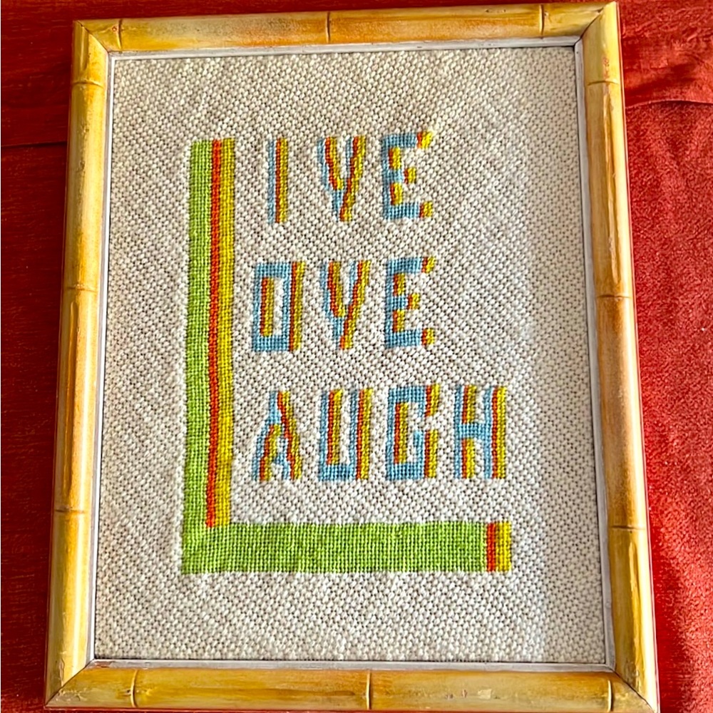 Vintage 70’s needlepoint… Live, Love, Laugh” in faux bamboo frame. 12”x 15.5”